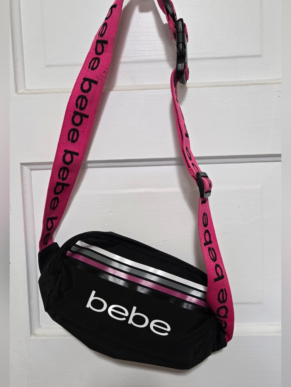 bebe Black Crossbody Waist Bag with Pink Strap